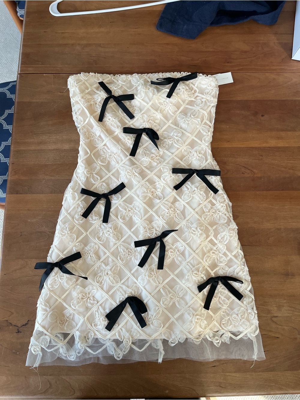 Ivory Mini Dress with Black Bow Accents - Feminine Occasion Dress - Picture 2 of 2